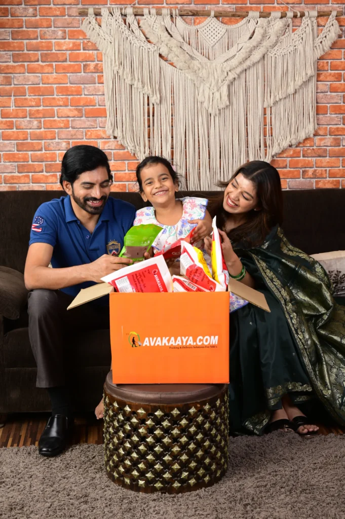 Happy family unboxing AVAKAAYA.COM package at home, showcasing express courier services & best packing services for safe delivery.