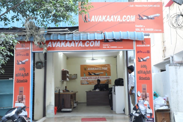 AVAKAAYA.COM office front view showcasing courier services to USA, UK, Canada, promoting trusted transportation and logistics company.